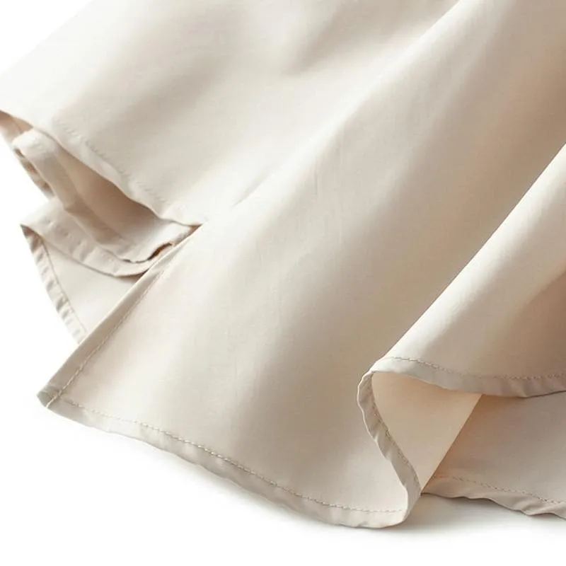 AYSMMETRICAL PLEATED MIDI SKIRT